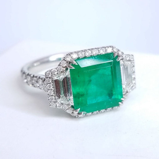 4.46 Total Carat Emerald and Diamond Halo Ladies Ring. GIA Certified.