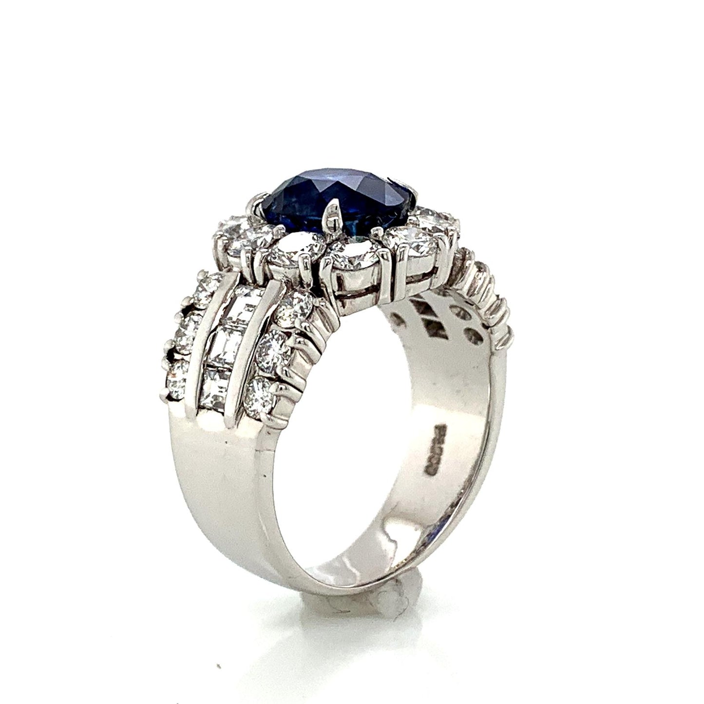 Sapphire and Diamond Halo Ladies Ring with Side Diamonds in Platinum