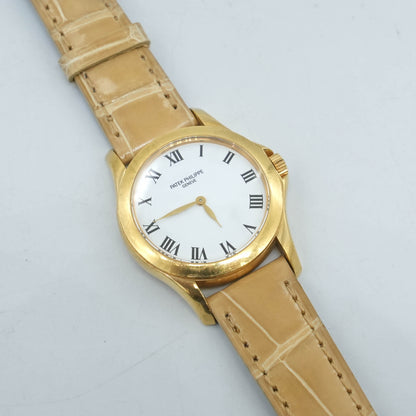 PATEK PHILIPPE 18K Yellow Gold 28mm Calatrava 4905J ladies manual winding