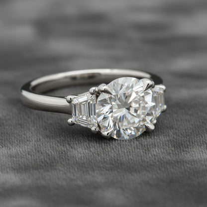 Lab Diamond~ Round Brilliant Cut Engagement Ring With Trapezoid Side Stones