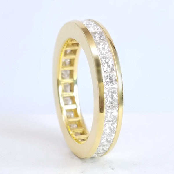 "ETNBD01840" Princess Cut Diamond Eternity Band in 18K Yellow Gold