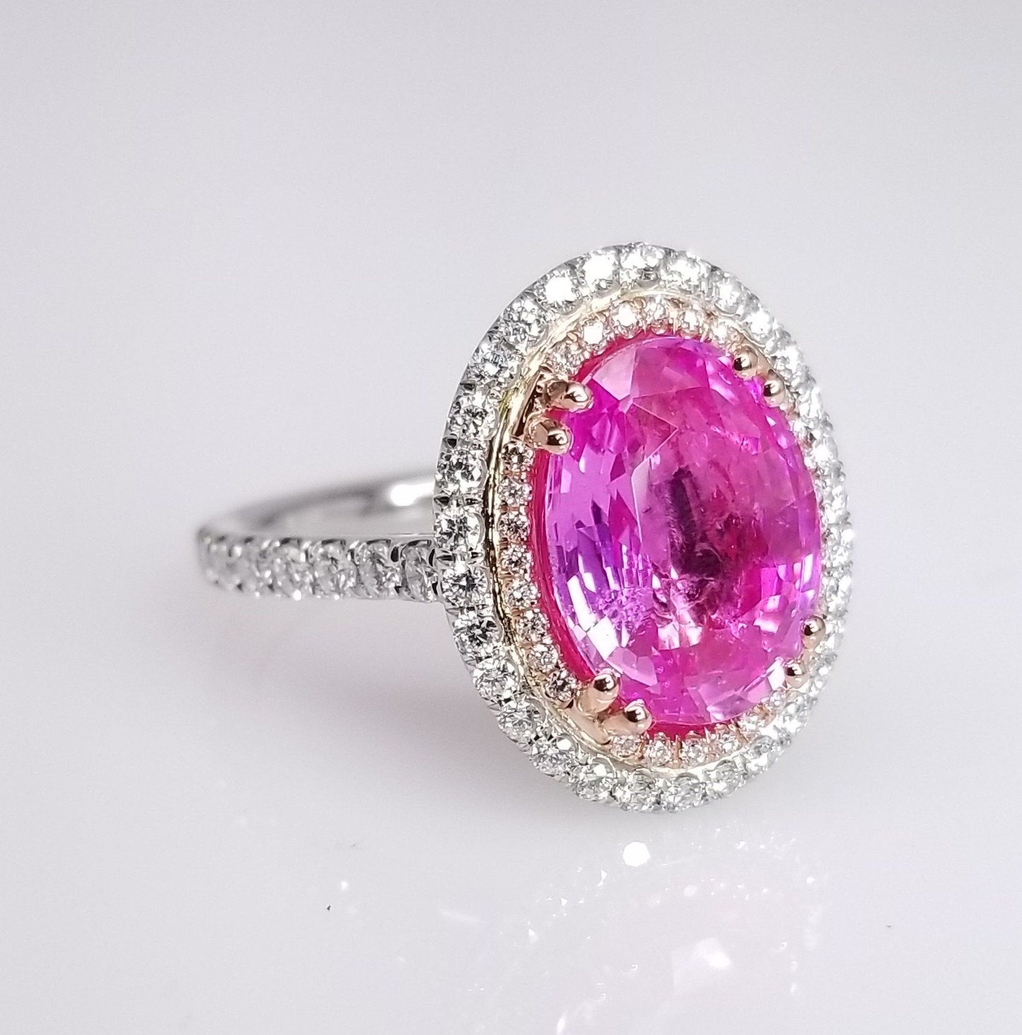 4.56 Total Carat Oval Pink Sapphire and Diamond Double Halo Pave-Set Ladies Ring. GIA Certified.