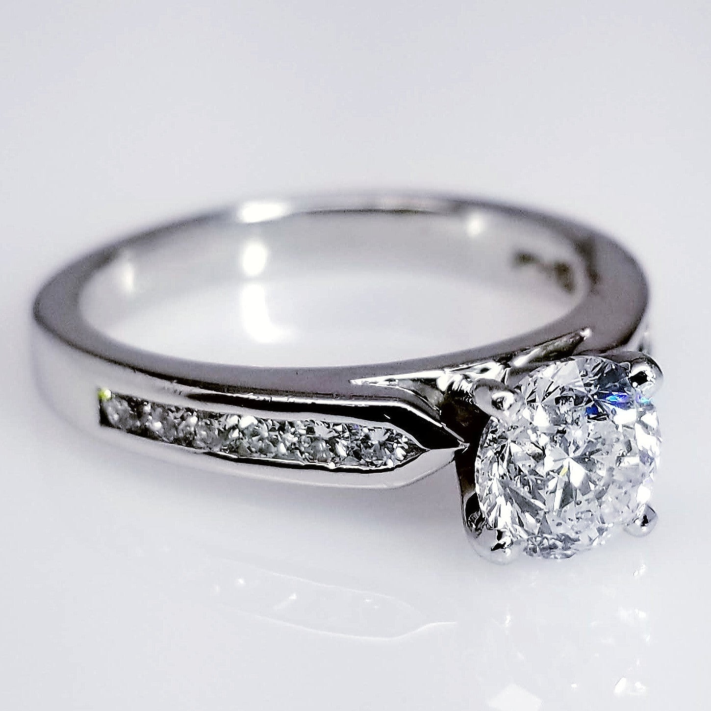 "ENGR01888" Traditional Channel Set Round Cut Solitaire Ring