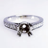 Tappering Diamond Engagement Ring Setting For A Round Cut