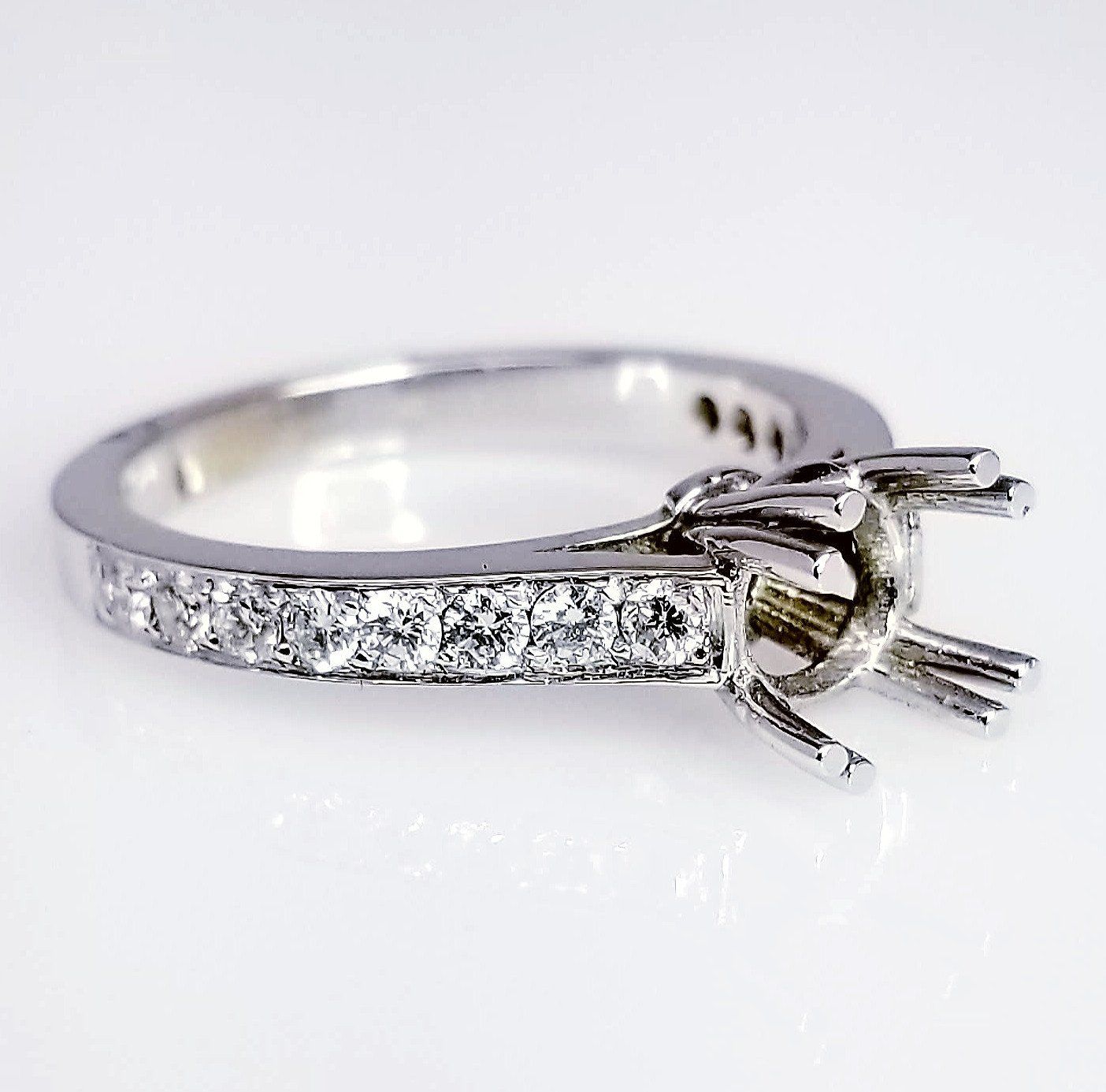 Tappering Diamond Engagement Ring Setting For A Round Cut