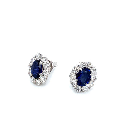 "EARR01574" Oval Shaped Natural Blue Sapphire with Diamond Halo Stud Earrings