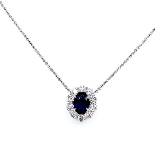 "PEND01794" Oval Shaped Sapphire and Diamond Halo Pendant in 18K White Gold