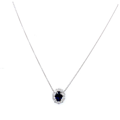 "PEND01794" Oval Shaped Sapphire and Diamond Halo Pendant in 18K White Gold