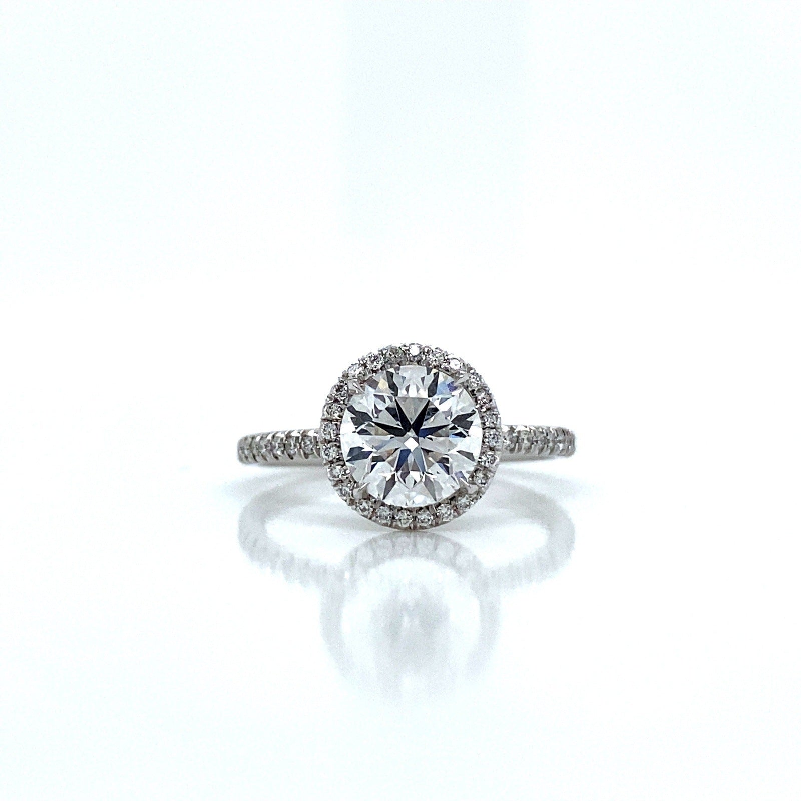 "ENGR03305" Round Diamond With Thin Halo Engagement Ring in Platinum
