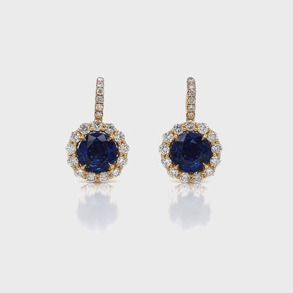 6.23 Total Carat Blue Sapphire and Diamond Halo Pave Earrings in 18K Gold