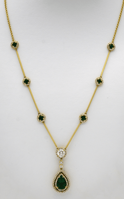 "PEND01395" Emerald and Diamond Teardrop Necklace in Yellow Gold