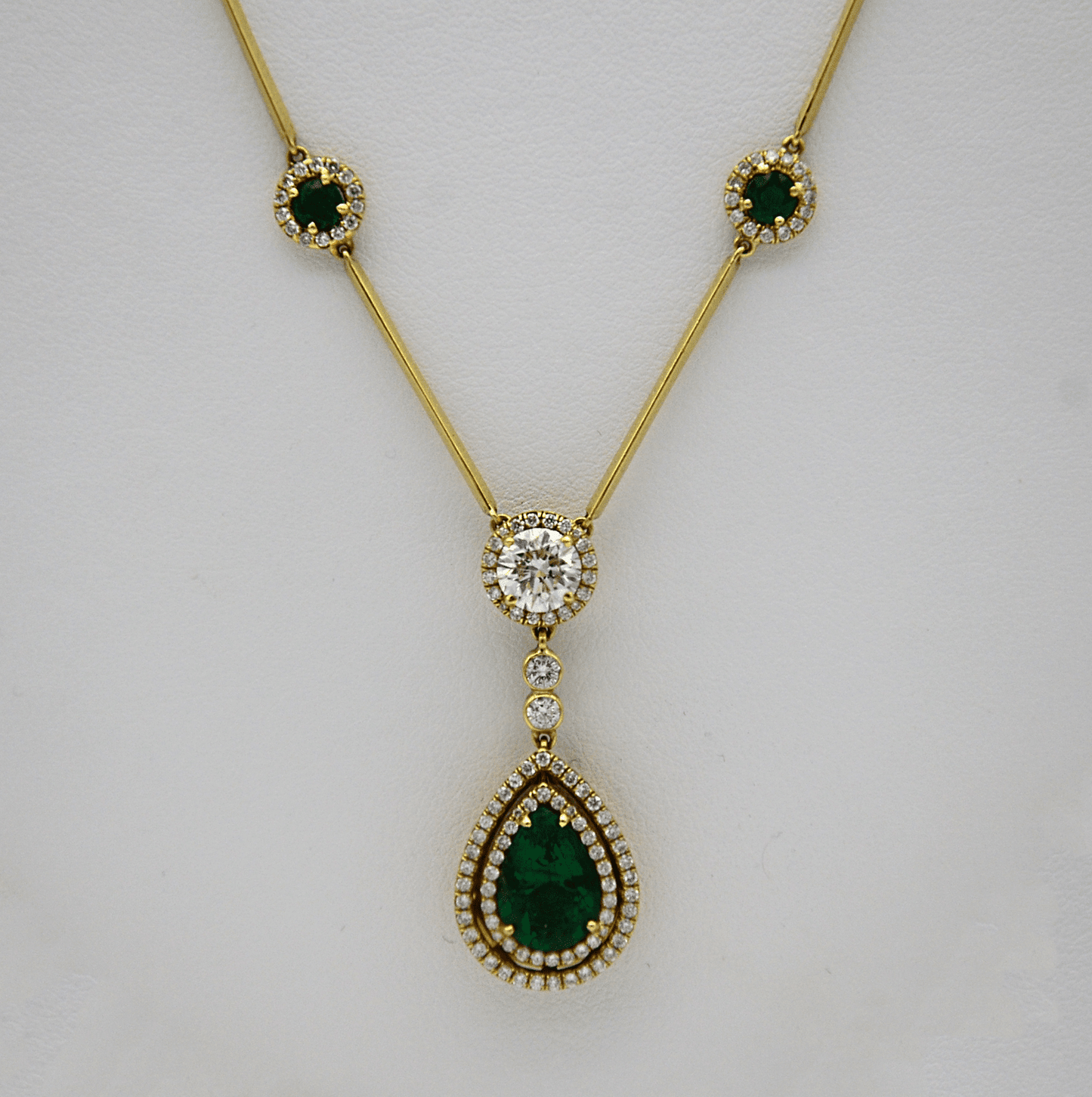 "PEND01395" Emerald and Diamond Teardrop Necklace in Yellow Gold