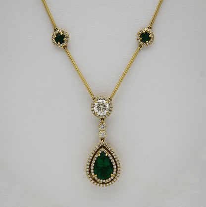 "PEND01395" Emerald and Diamond Teardrop Necklace in Yellow Gold