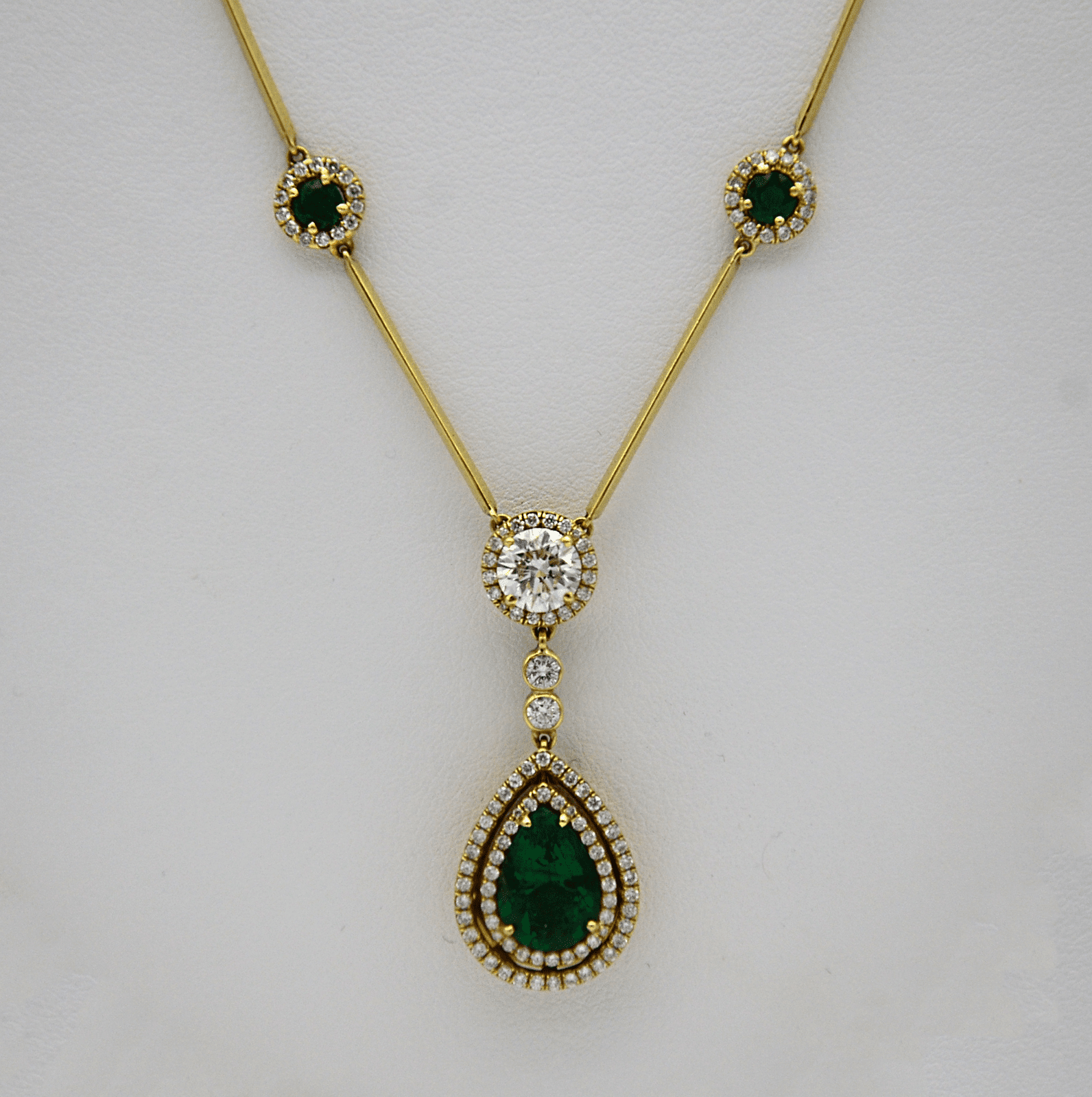 "PEND01395" Emerald and Diamond Teardrop Necklace in Yellow Gold