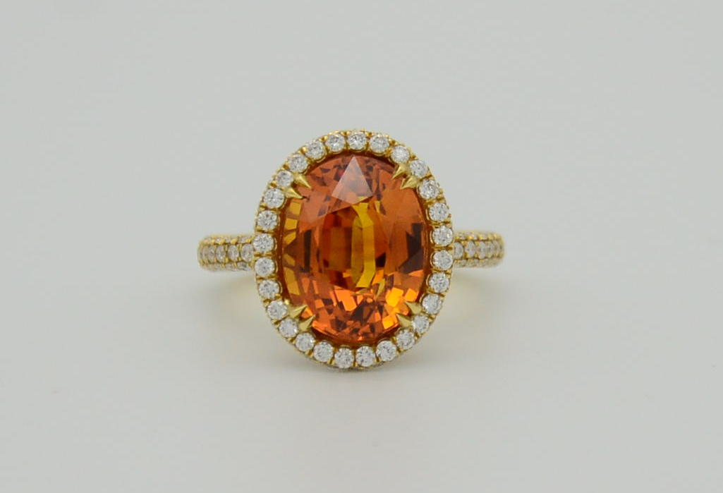 9.28 Total Carat Orange Sapphire and Diamond Halo Ladies Ring. GIA Certified.