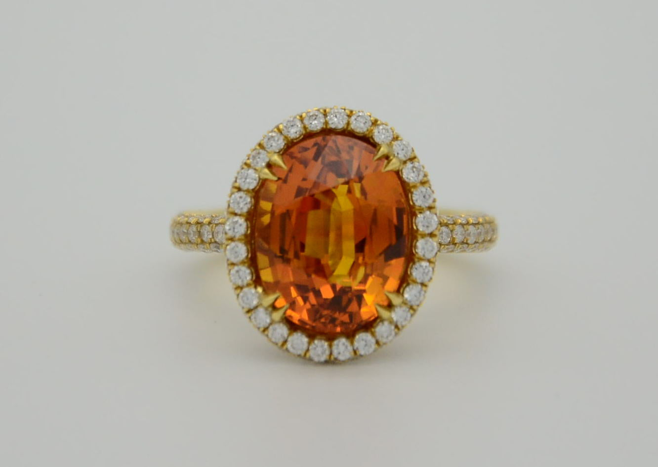 9.28 Total Carat Orange Sapphire and Diamond Halo Ladies Ring. GIA Certified.