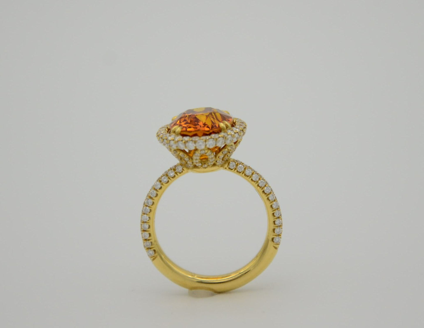 9.28 Total Carat Orange Sapphire and Diamond Halo Ladies Ring. GIA Certified.