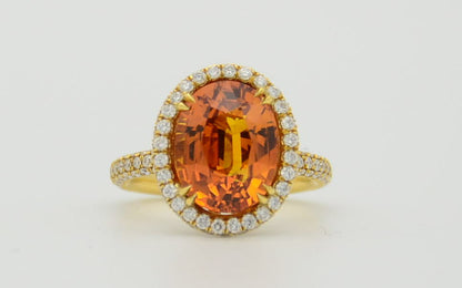 9.28 Total Carat Orange Sapphire and Diamond Halo Ladies Ring. GIA Certified.