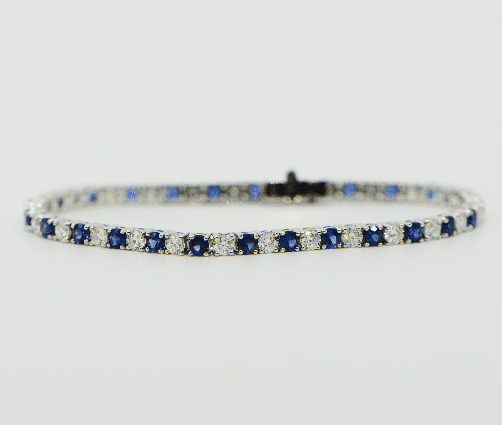 "BRAC01384" Sapphire and Diamond 18K White Gold Tennis Bracelet