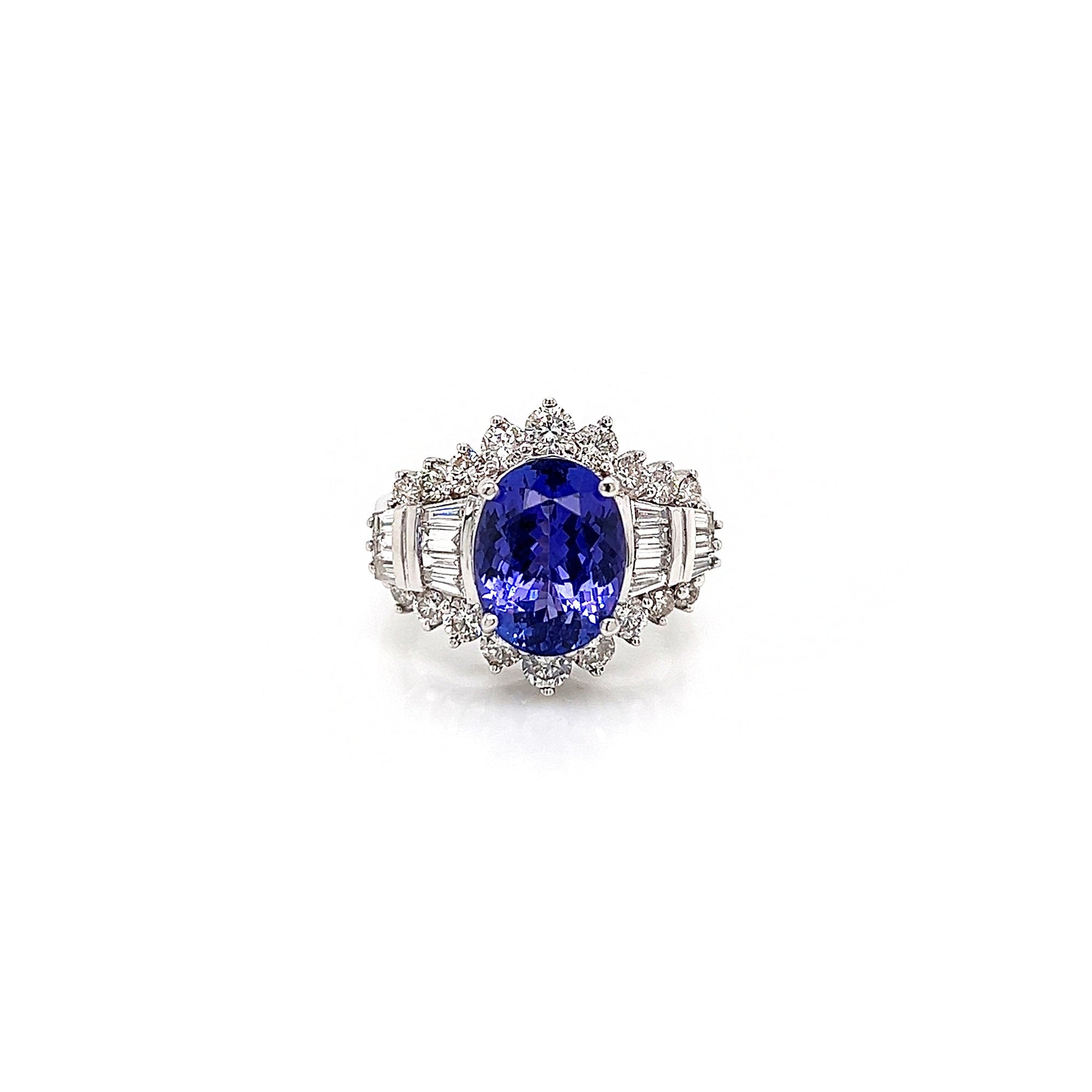 6.18 Total Carat Tanzanite and Diamond Ladies Engagement Ring in 14K White Gold One look is all it takes to fall in love with this mesmerizing tanzanite engagement ring