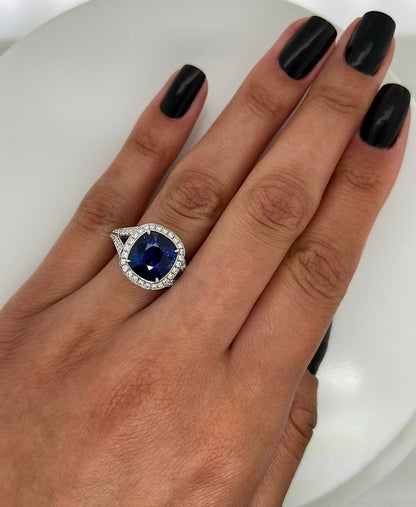 7.09 Total Carat Sapphire and Diamond Halo Pave-Set Ladies Engagement Ring