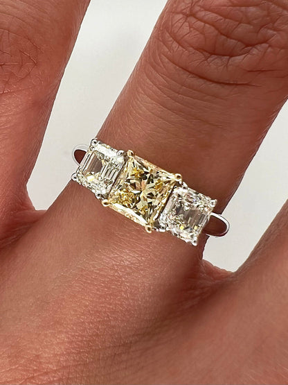 1.94 Total Carat Fancy Yellow Diamond Three Stone Ladies Engagement Ring. GIA Certified.