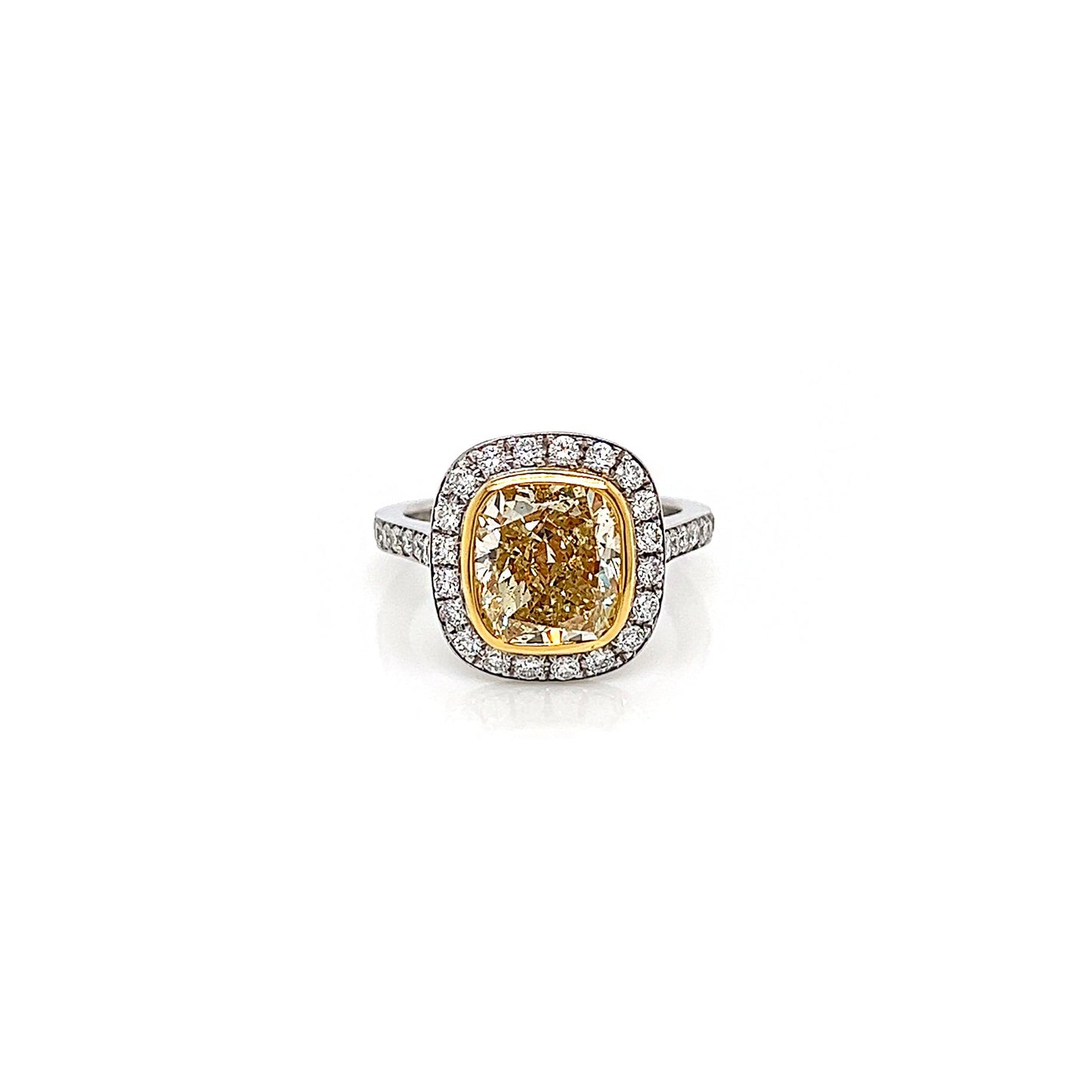 4.31 Total Carat Fancy Yellow Diamond Ladies Halo Pave-Set Engagement Ring. GIA Certified.