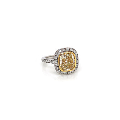 4.31 Total Carat Fancy Yellow Diamond Ladies Halo Pave-Set Engagement Ring. GIA Certified.