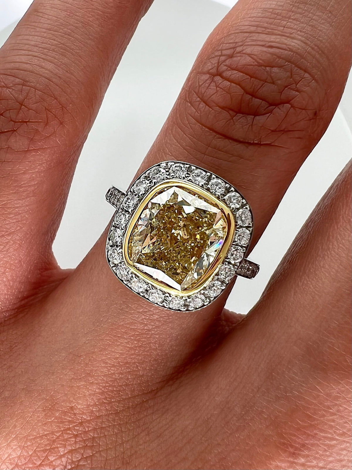 4.31 Total Carat Fancy Yellow Diamond Ladies Halo Pave-Set Engagement Ring. GIA Certified.
