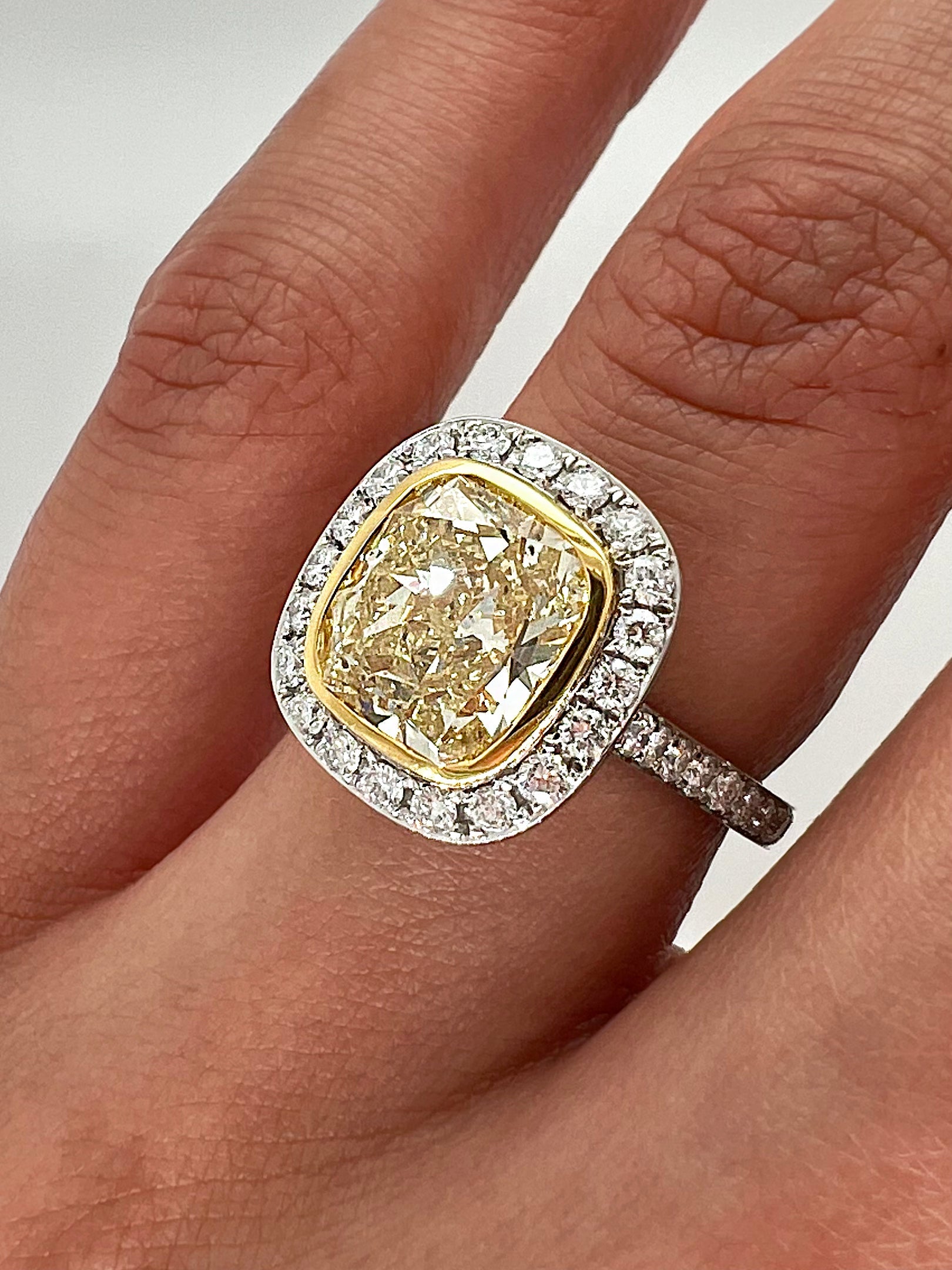 4.31 Total Carat Fancy Yellow Diamond Ladies Halo Pave-Set Engagement Ring. GIA Certified.