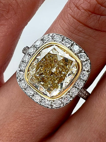 4.31 Total Carat Fancy Yellow Diamond Ladies Halo Pave-Set Engagement Ring. GIA Certified.