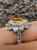 7.26 Total Carat Pear Shaped Halo GIA-certified Yellow Natural Diamond Ring