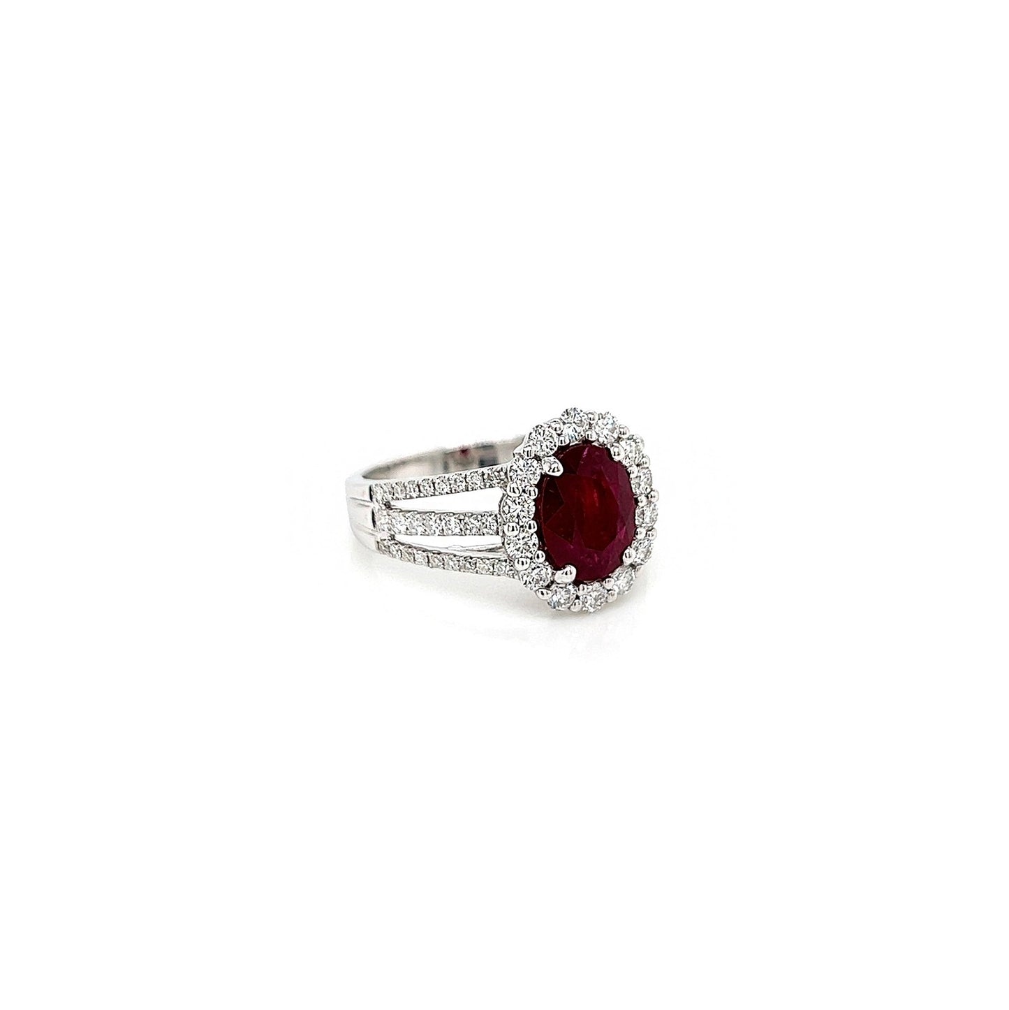 2.90 Total Carat Oval Ruby and Diamond Halo Ladies Ring. GIA Certified.
