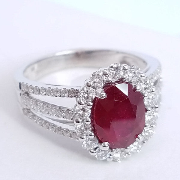 2.90 Total Carat Oval Ruby and Diamond Halo Ladies Ring. GIA Certified.