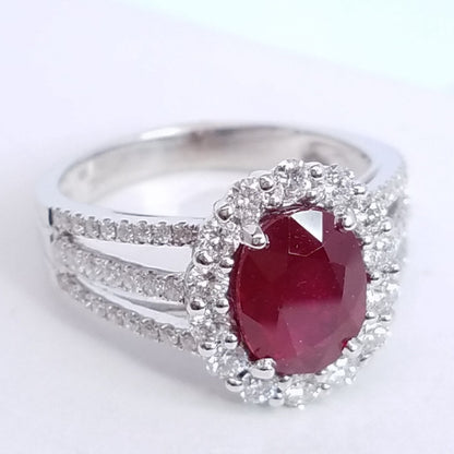 2.90 Total Carat Oval Ruby and Diamond Halo Ladies Ring. GIA Certified.