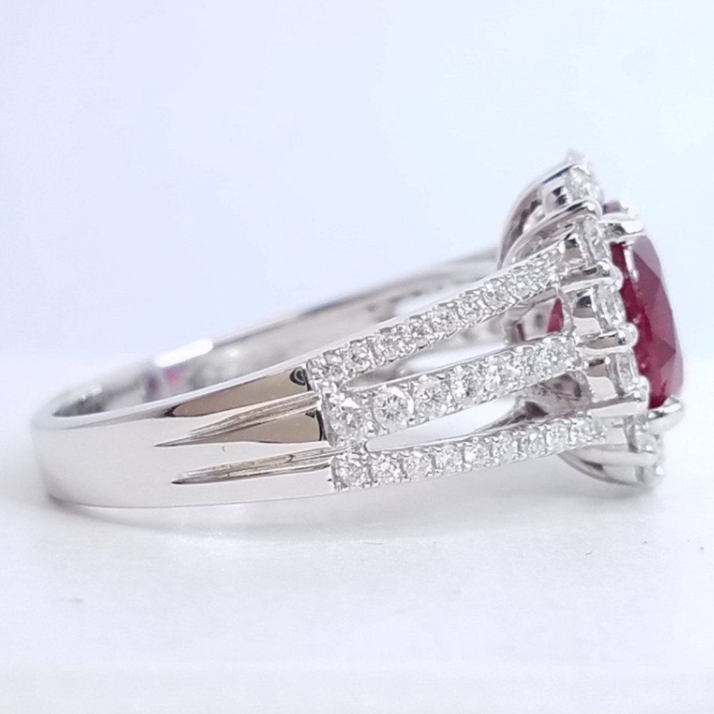 2.90 Total Carat Oval Ruby and Diamond Halo Ladies Ring. GIA Certified.