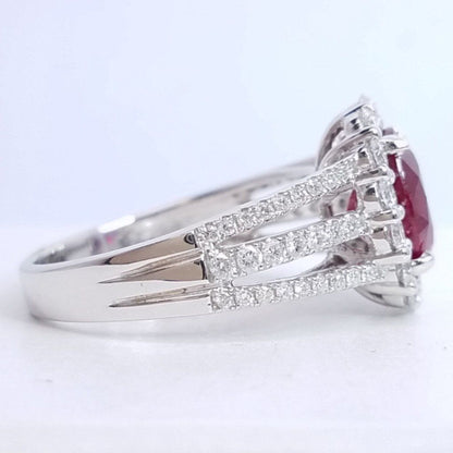 2.90 Total Carat Oval Ruby and Diamond Halo Ladies Ring. GIA Certified.