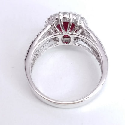 2.90 Total Carat Oval Ruby and Diamond Halo Ladies Ring. GIA Certified.