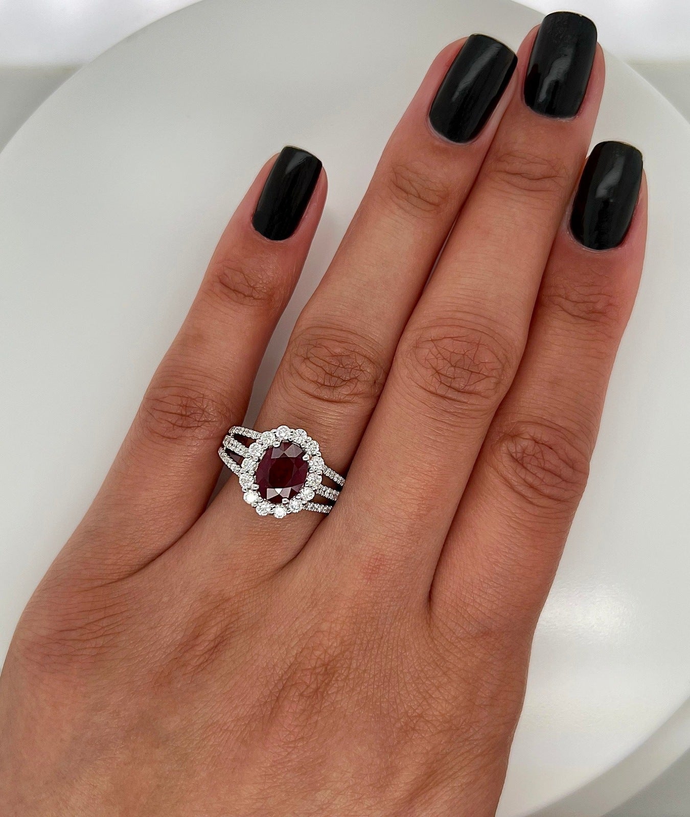 2.90 Total Carat Oval Ruby and Diamond Halo Ladies Ring. GIA Certified.
