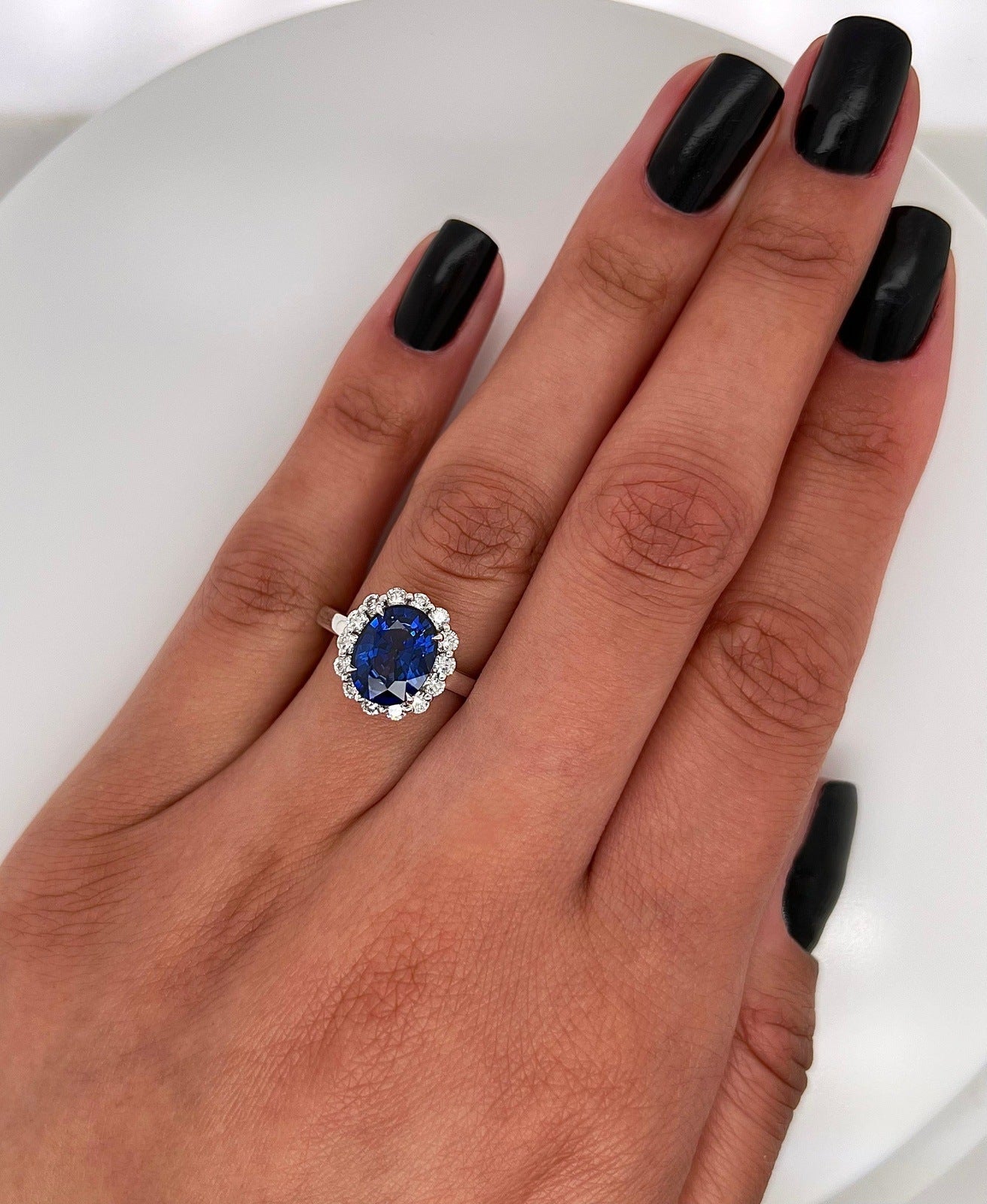 3.75 Total Carat Oval Blue Sapphire and Diamond Halo Ladies Engagement Ring