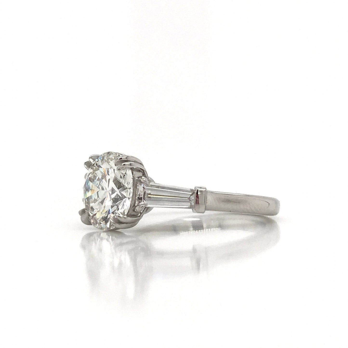 "ENGR03327" Round Diamond With Side Baguettes Three Stone Engagement Ring