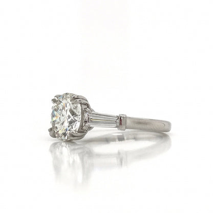 "ENGR03327" Round Diamond With Side Baguettes Three Stone Engagement Ring