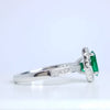 0.74 Total Carat Sweet Emerald & Diamond Halo Ring