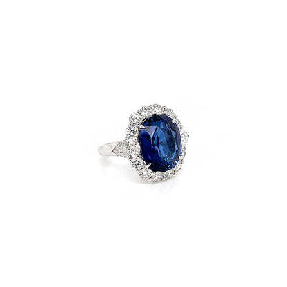 12.59 Total Carat Sapphire and Diamond Halo Vintage Style Ladies Engagement Ring. GIA Certified