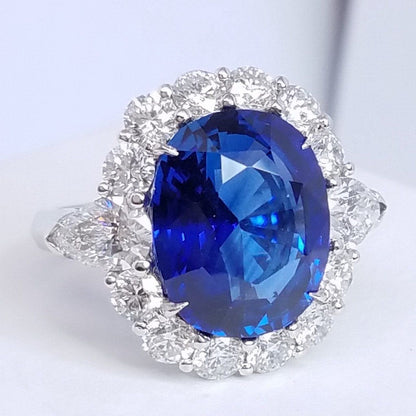 12.59 Total Carat Sapphire and Diamond Halo Vintage Style Ladies Engagement Ring. GIA Certified