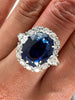 12.59 Total Carat Sapphire and Diamond Halo Vintage Style Ladies Engagement Ring. GIA Certified