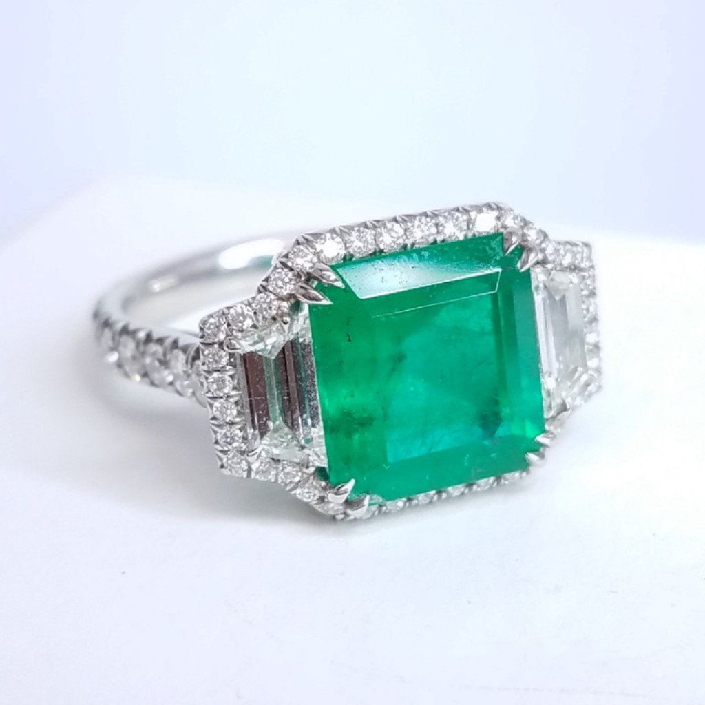4.46 Total Carat Emerald and Diamond Halo Ladies Ring. GIA Certified.