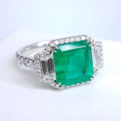 4.46 Total Carat Emerald and Diamond Halo Ladies Ring. GIA Certified.