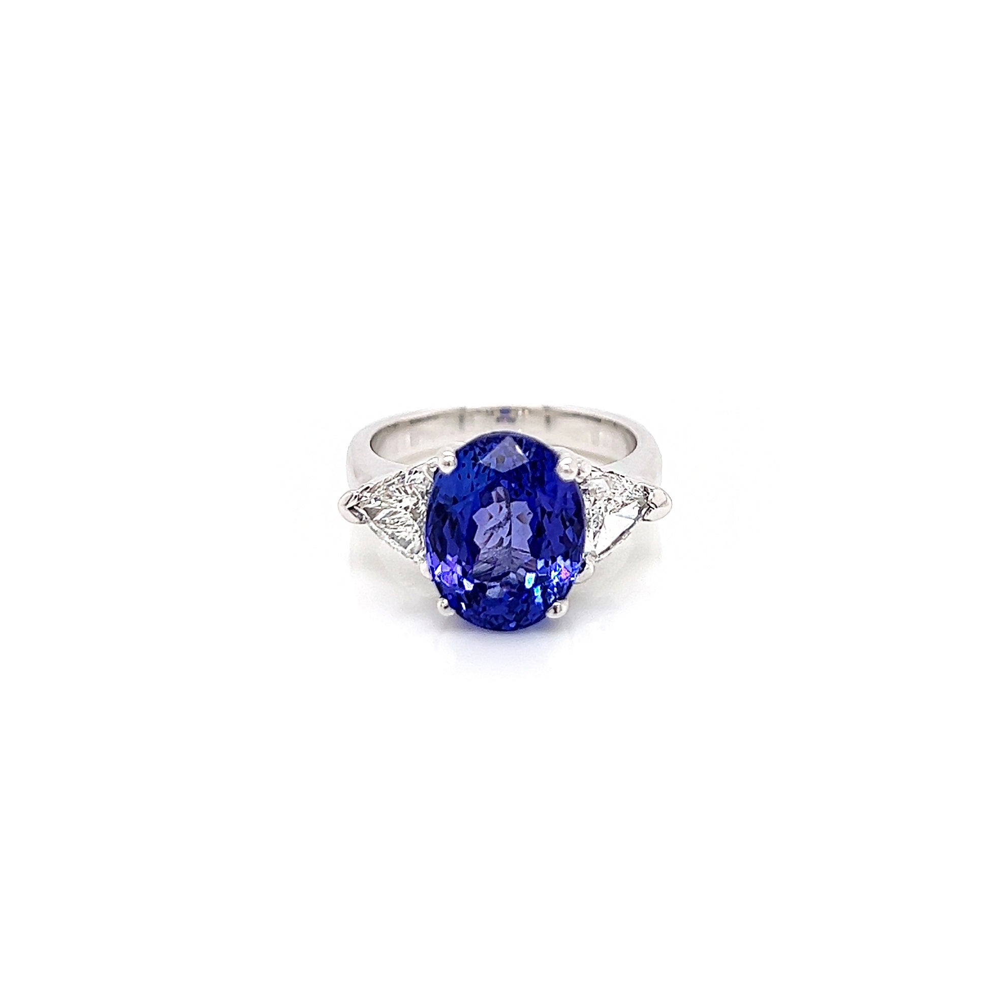 7.18 Total Carat Tanzanite and Diamond Three Stone Ladies Ring