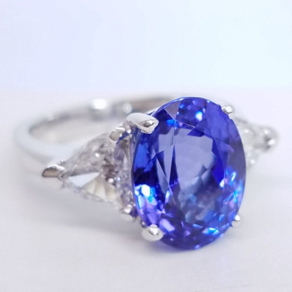 7.18 Total Carat Tanzanite and Diamond Three Stone Ladies Ring